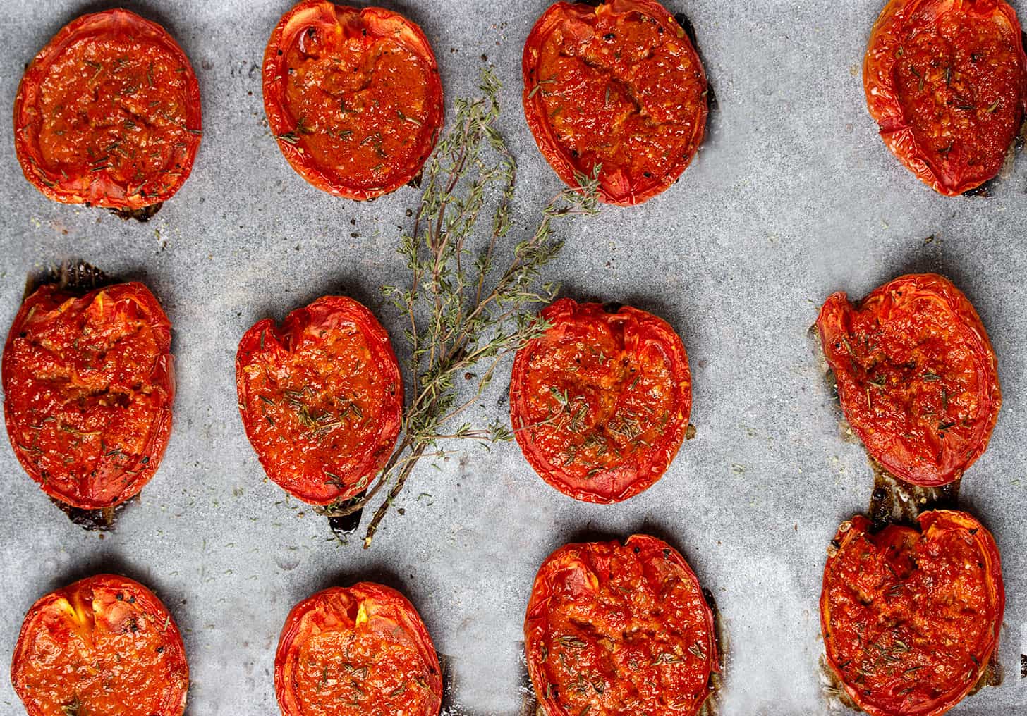 candied tomatoes after cooking on parchment paper