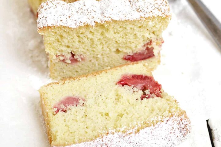 strawberry shortcake loaf sliced on white background