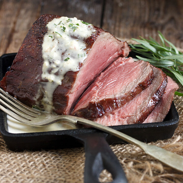 reverse seared chateaubriand on skillet with bernaise sauce