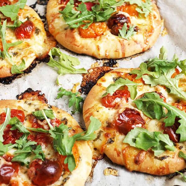 mini pizza with cherry tomatoes and bocconcini