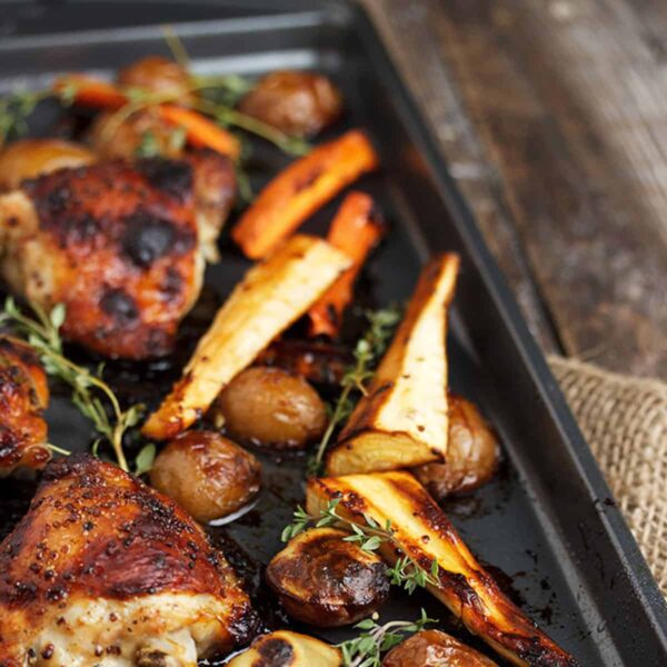 honey mustard sheet pan chicken thighs with vegetables and potatoes