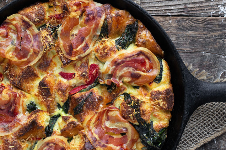 parmesan pancetta bread pudding in cast iron skillet
