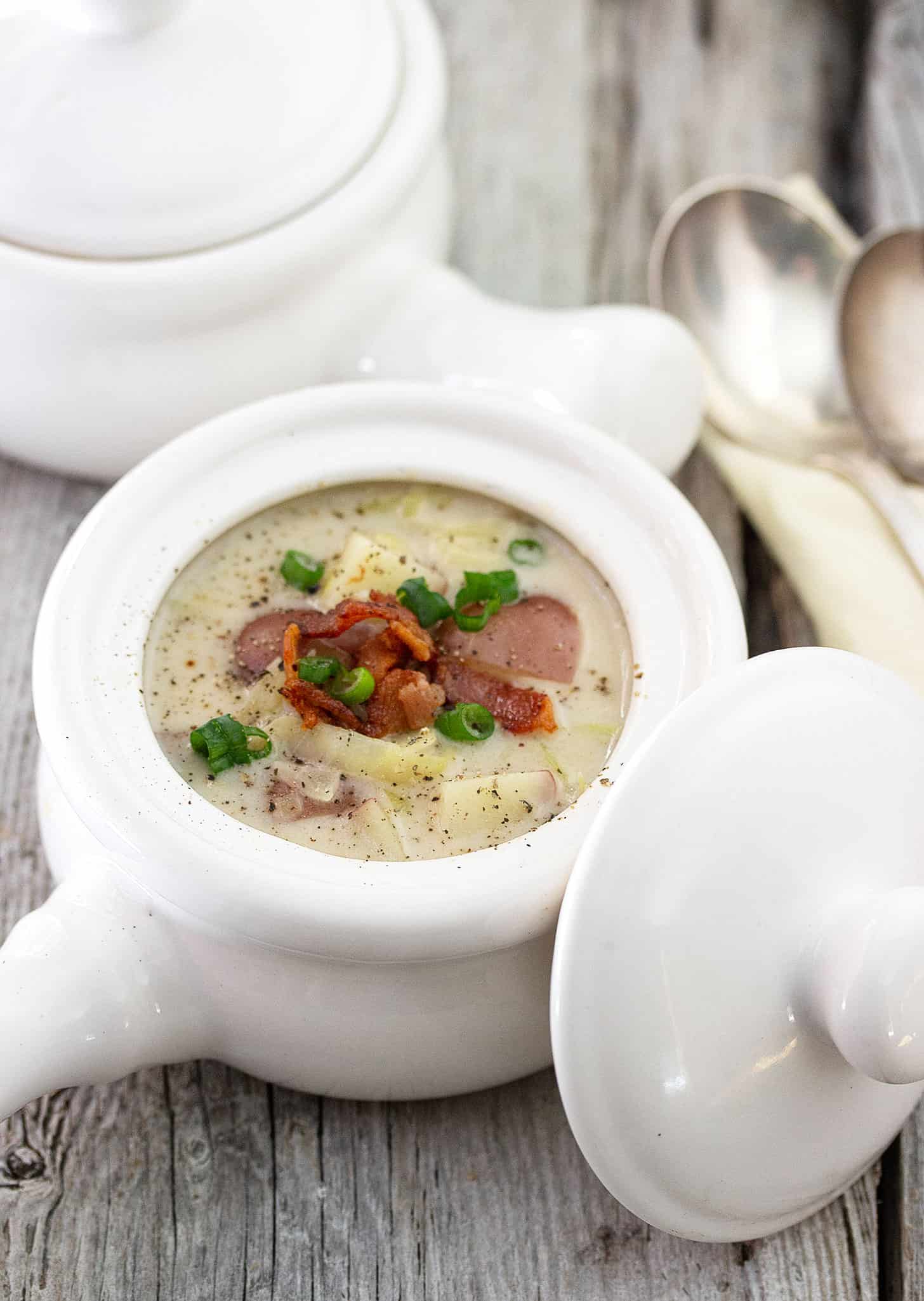 colcannon soup in white soup pots