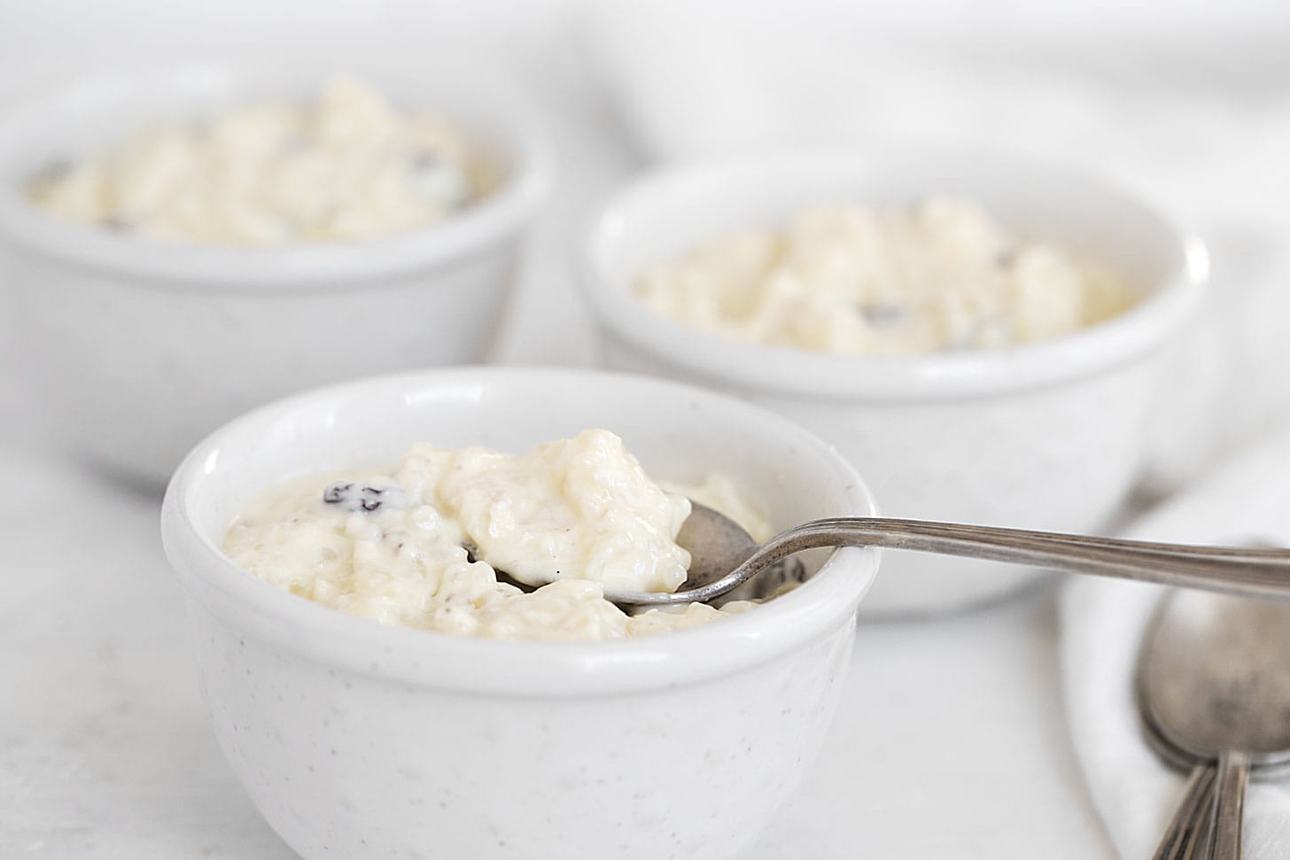 Creamy rice pudding in serving bowls.