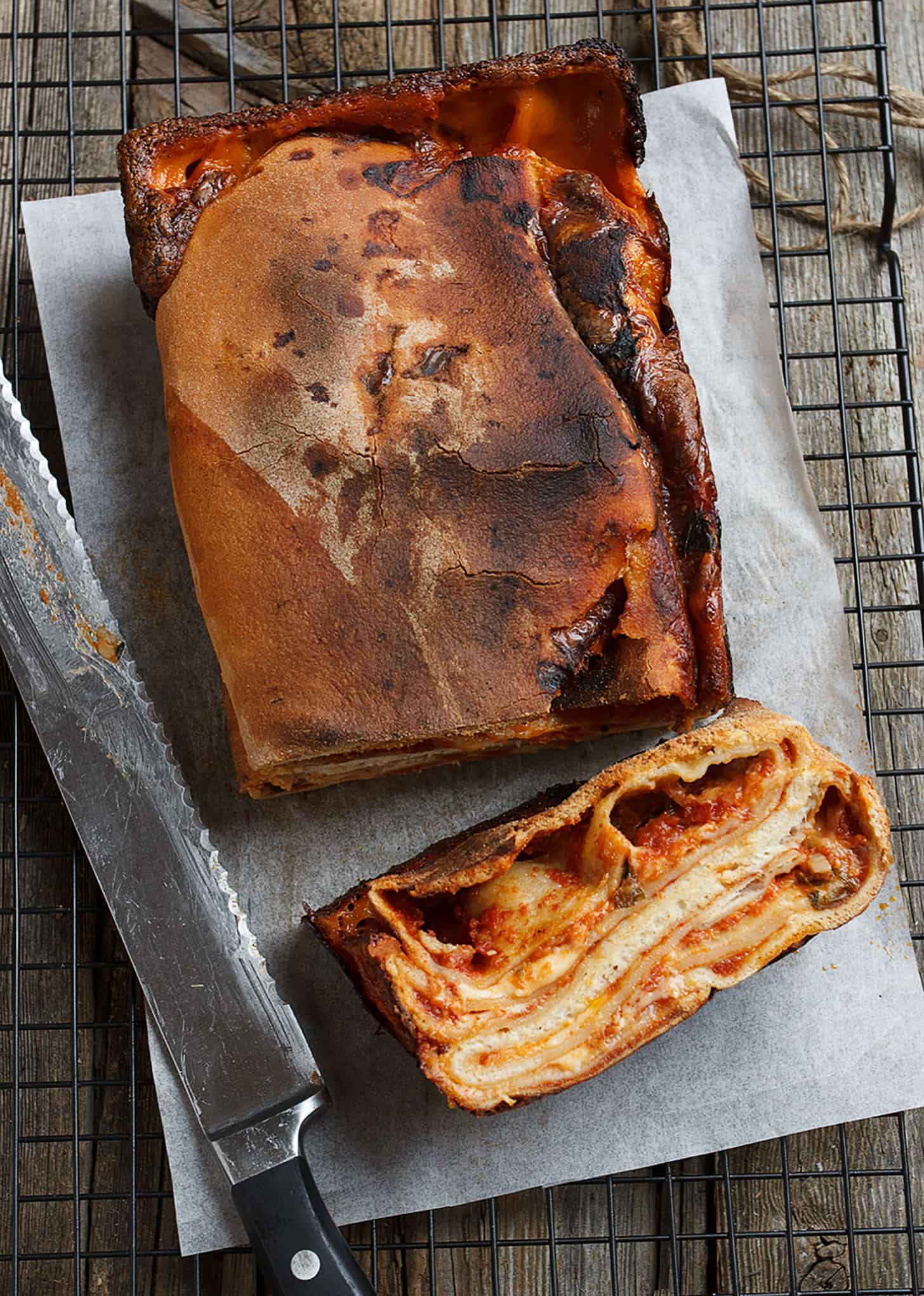 Italian scaccia sliced on parchment paper