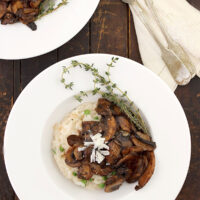 baked parmesan risotto topped with marsala wine mushrooms