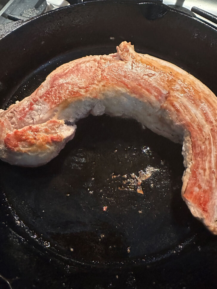 browning pork tenderloin in cast iron skillet