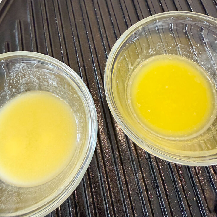 Two small bowls of melted butter.