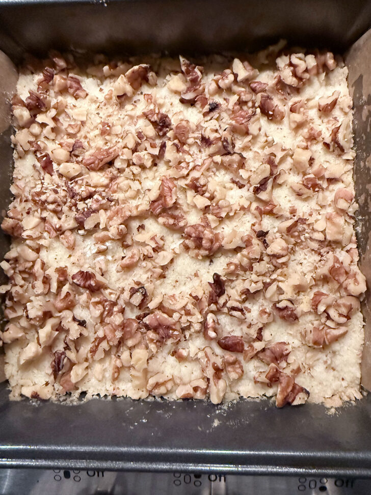 Walnut scattered over the baked crust.