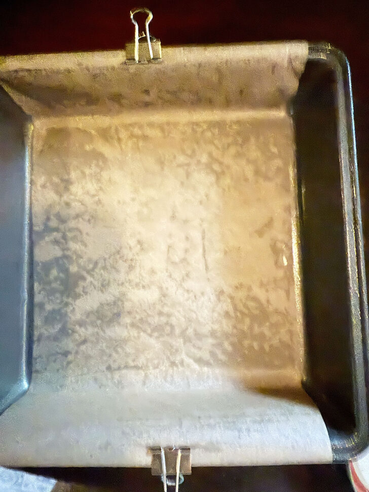 Prepared baking pan for the squares.