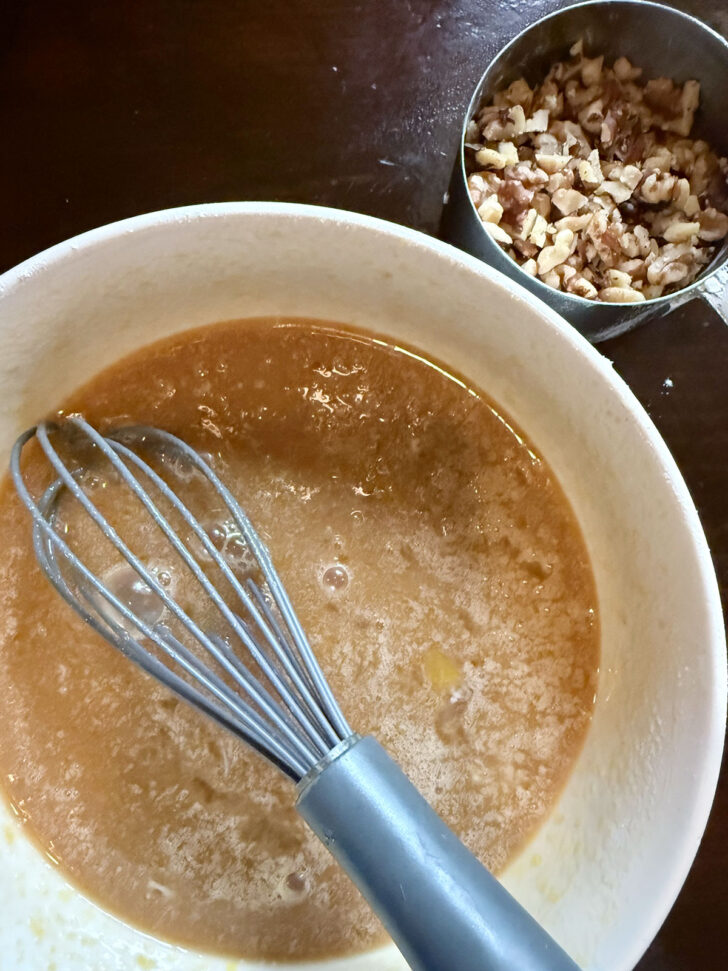 Filling ingredients mixed together with the walnuts on the side.