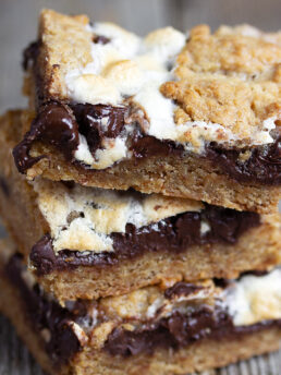 S'mores cookie bars sliced on cooling rack.