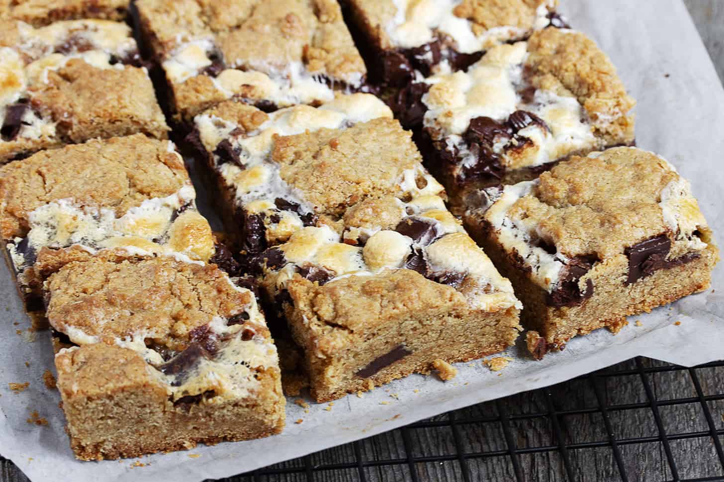 S'mores cookie bars sliced on a cooling rack.