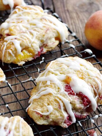 peach and raspberry scones on cooling rack