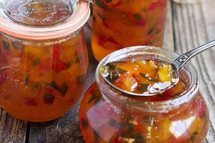 peach and pepper jam in jars