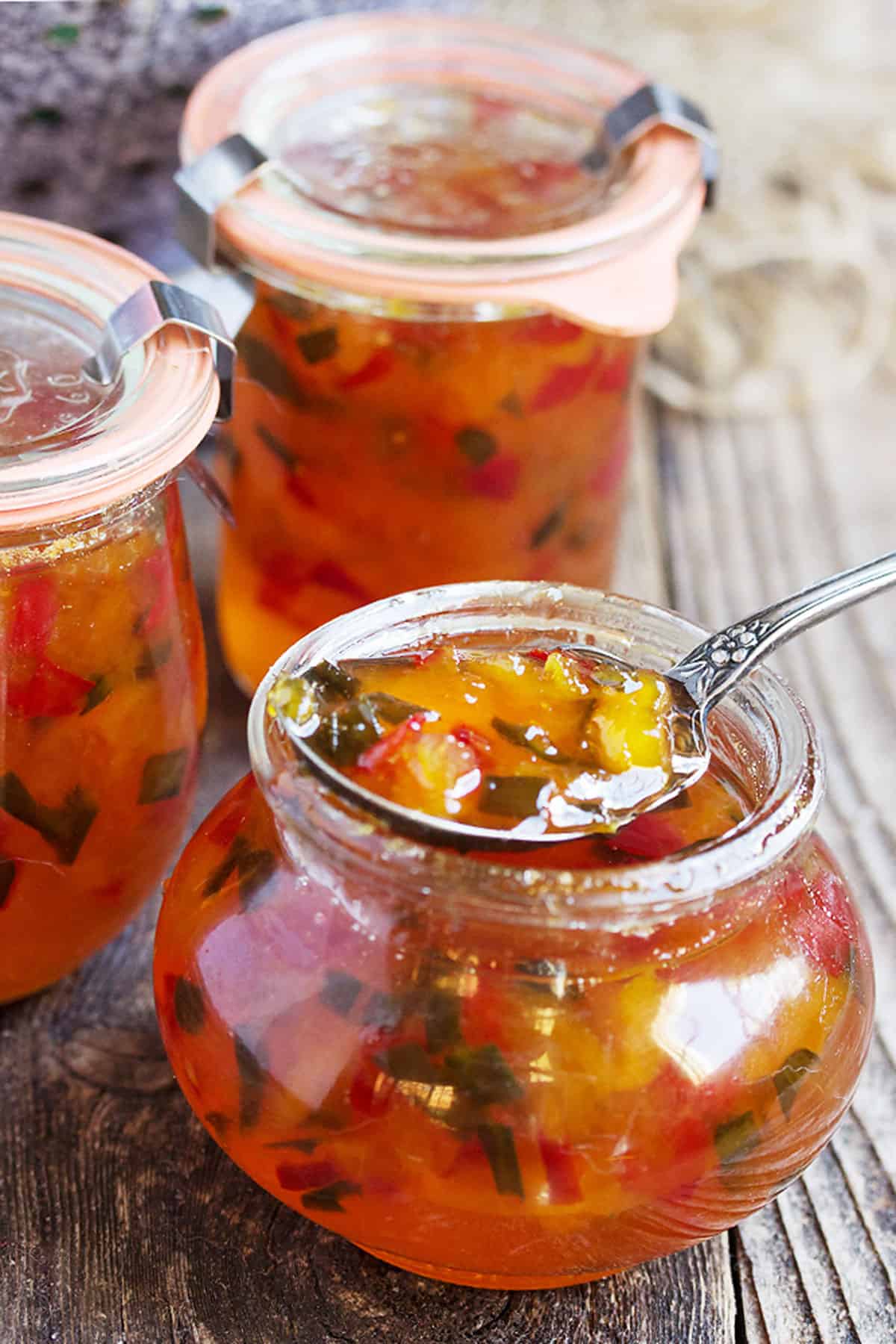 peach and pepper jam in jars