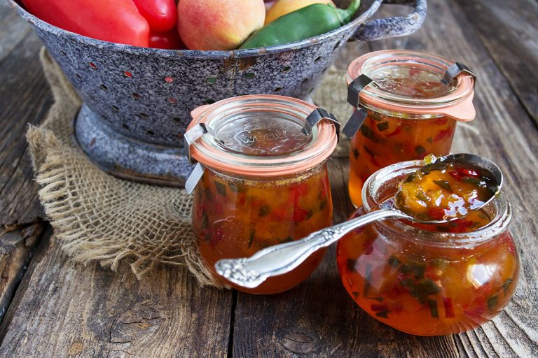 peach and pepper jams in small jars