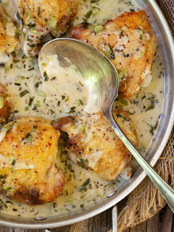 cornichon chicken thighs in serving dish