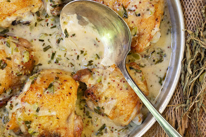 cornichon chicken thighs in serving dish