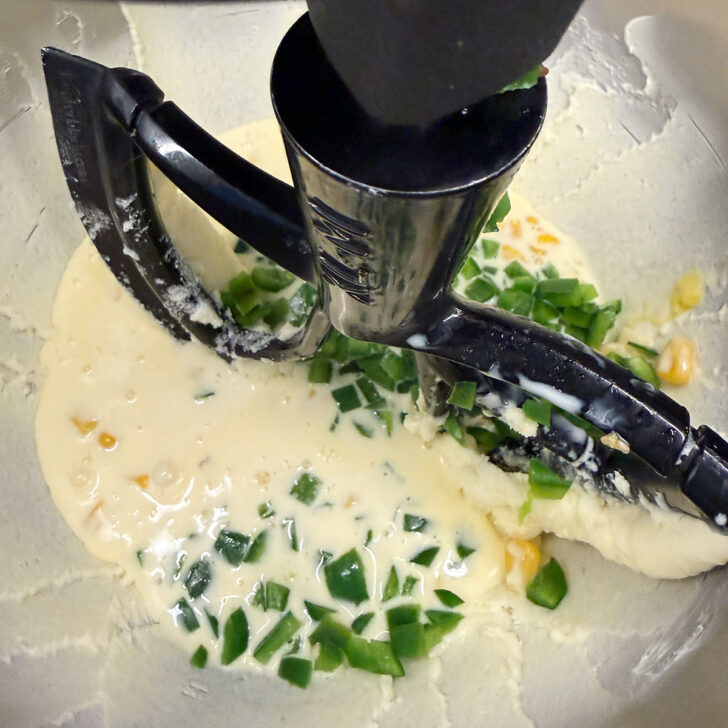 Corn, cream and egg mixture and the cooked jalapenos added to the cornmeal batter.
