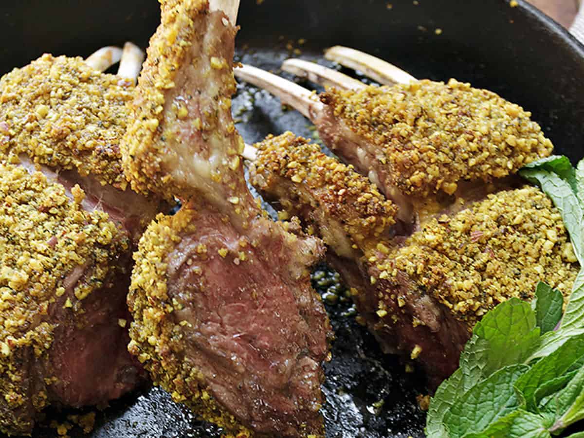 lamb chops with almond crust in cast iron skillet