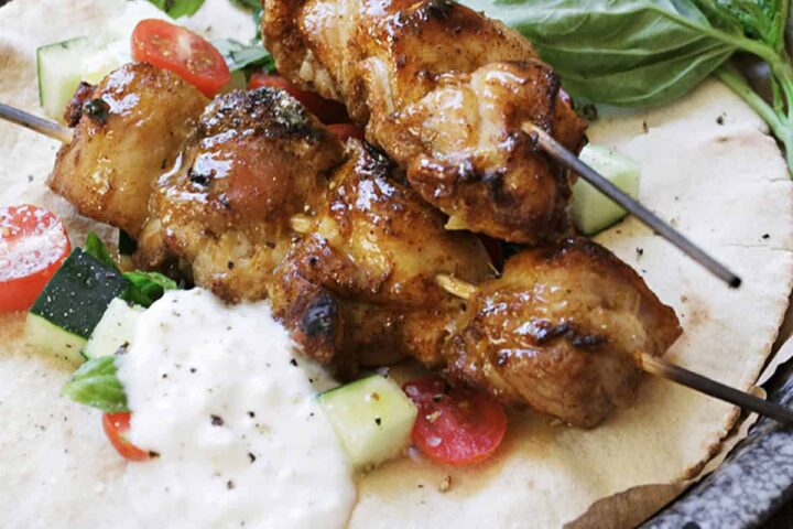 moroccan spiced chicken skewers with pita
