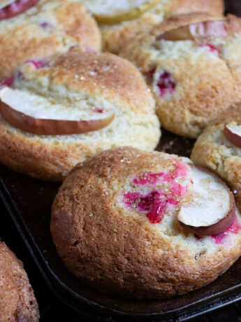cranberry muffins in muffin tins