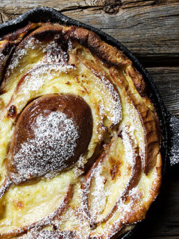 pear custard cake in cast iron skillet