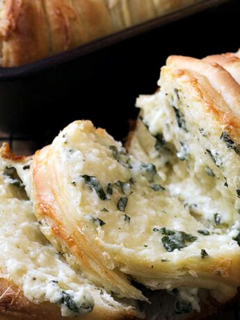 pull apart garlic cheese bread on cooling rack