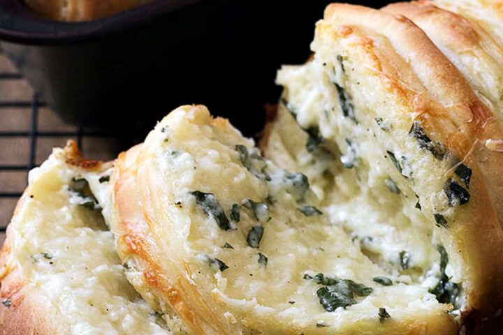 pull apart garlic cheese bread on cooling rack