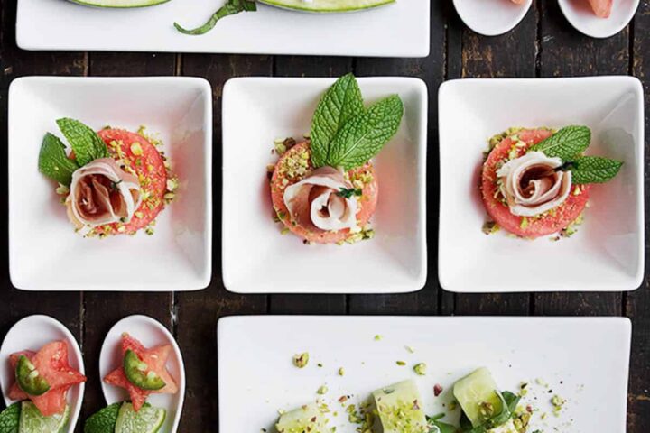 watermelon hors d'oeuvres on wooden board