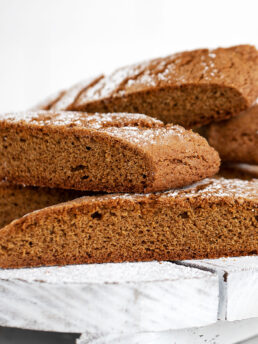 gingerbread biscotti on white serving board