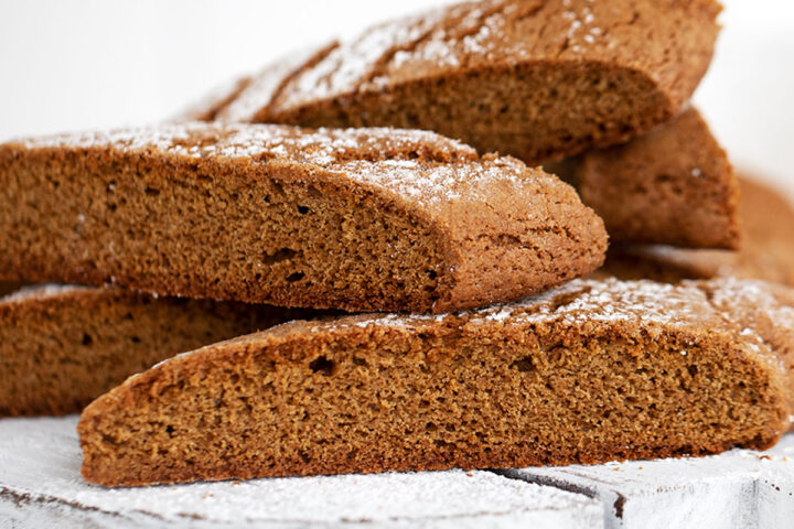 gingerbread biscotti on white serving board