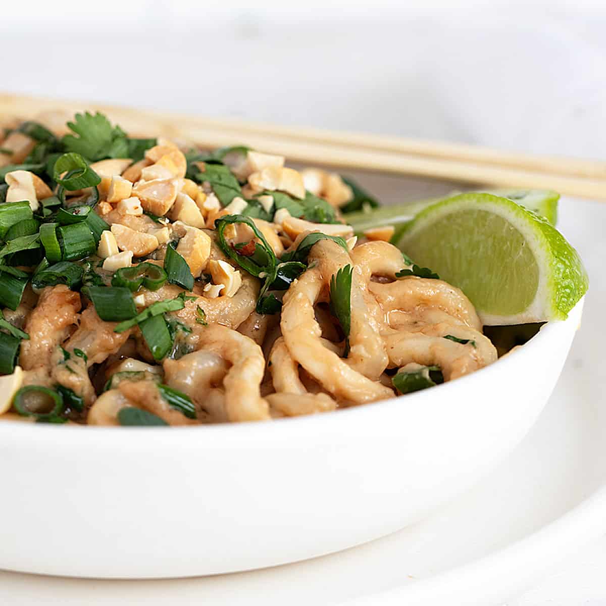 spicy peanut udon thick noodle creamy chilli sesame weeknight easy cozy