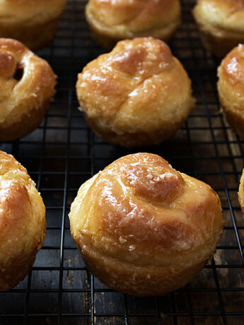 Sticky apple buns on cooling rack.
