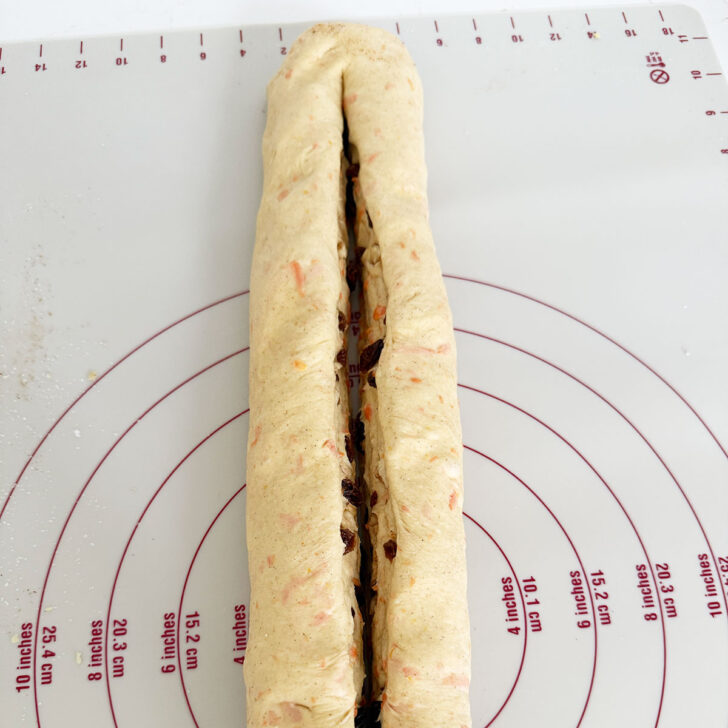 Dough roll sliced down the centre.