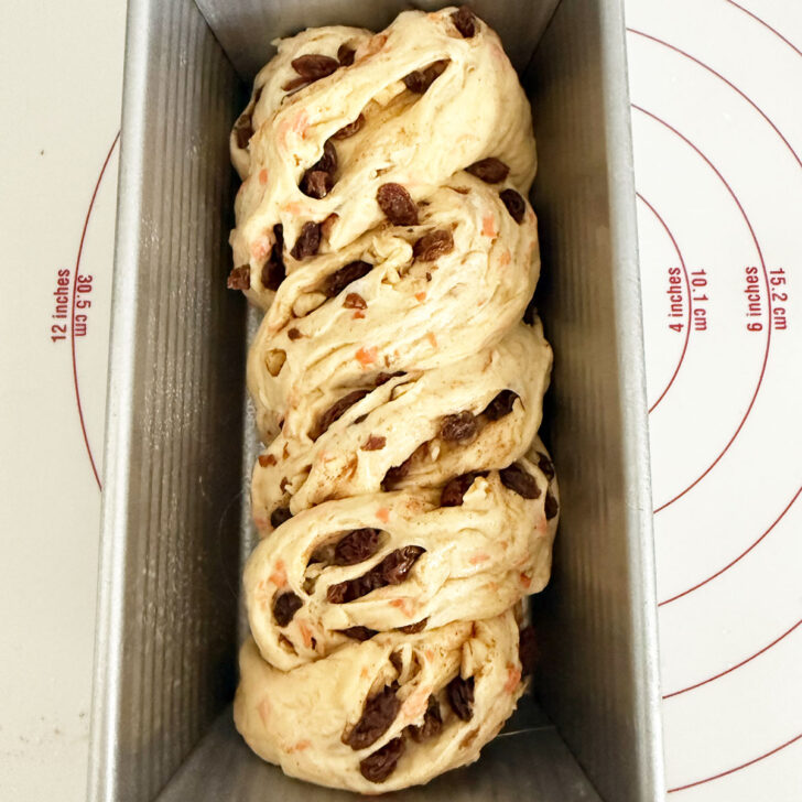 Twisted dough in the loaf pan.