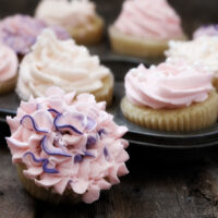 classic vanilla cupcakes with pink frosting