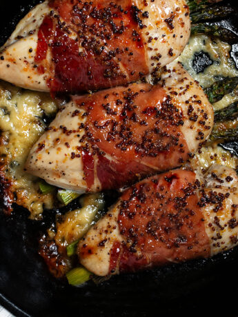 asparagus havarti stuffed chicken in cast iron skillet