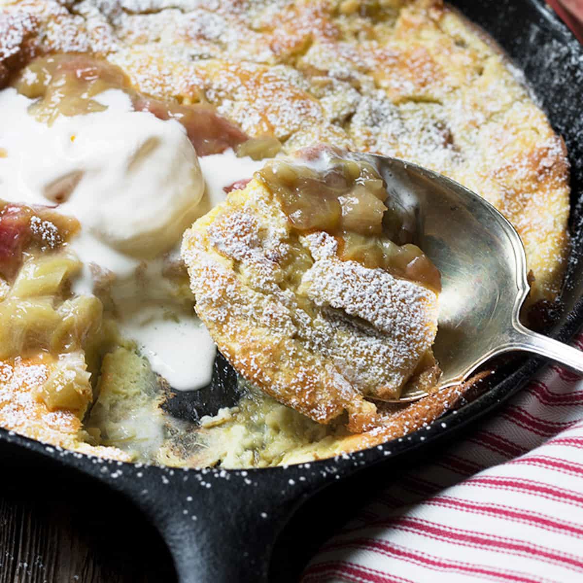 rhubarb dutch baby in cast iron skillet