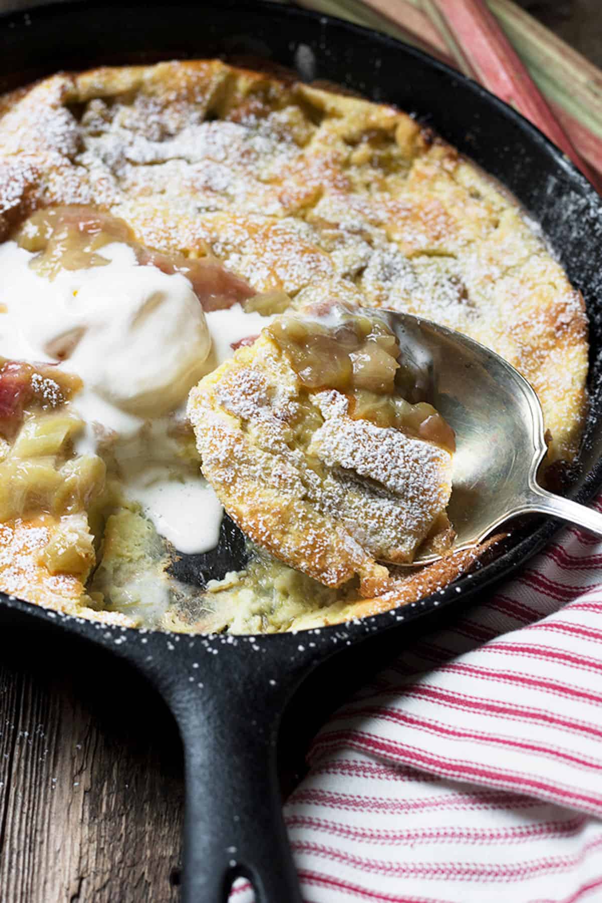 rhubarb dutch baby in cast iron skillet