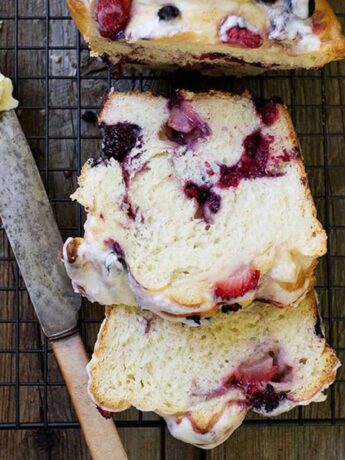 summer fruit yeast bread sliced on cooling rack
