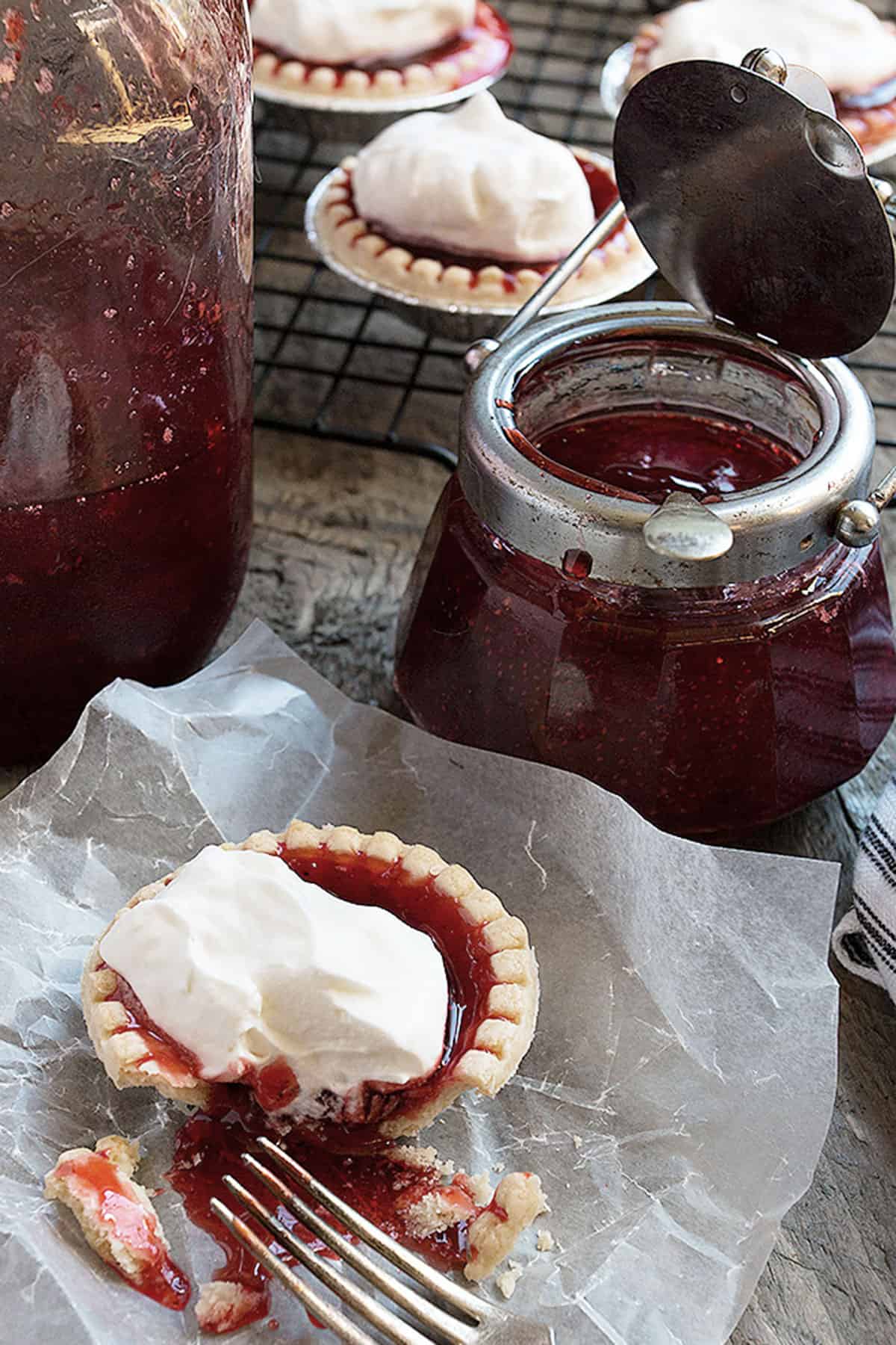 platter strawberry jam in jar with tarts
