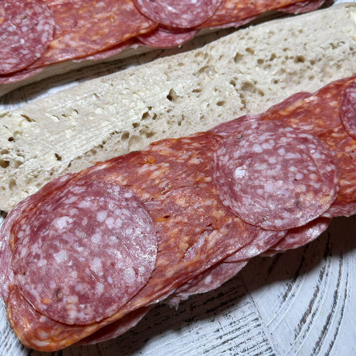 Italian deli meats layered on the ciabatta bread.