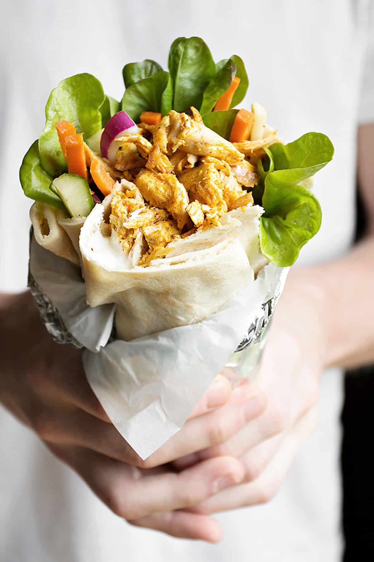 shawarma wrap held in hands
