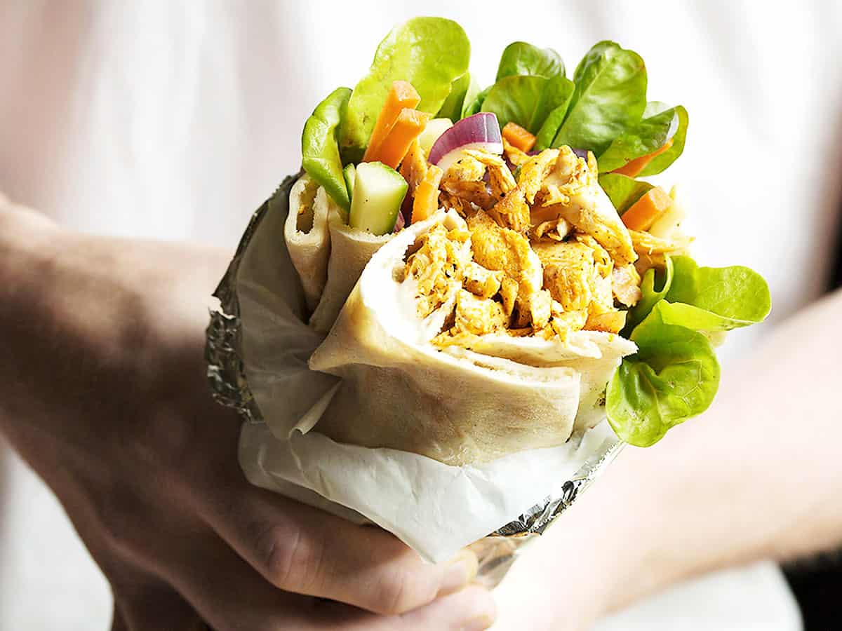 shawarma wrap held in hands