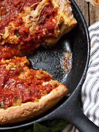 deep dish pizza in cast iron skillet