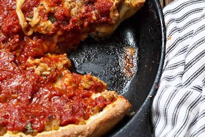 deep dish pizza in cast iron skillet
