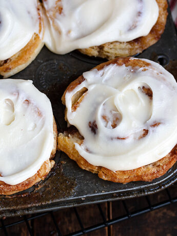 cinnamon roll biscuits in muffin tin
