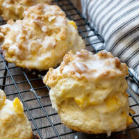 peach crisp biscuits on cooling rack